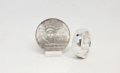 Bague pièce de monnaie 100 Francs "Statue de la liberté" en argent serti d'un saphir (coin ring)