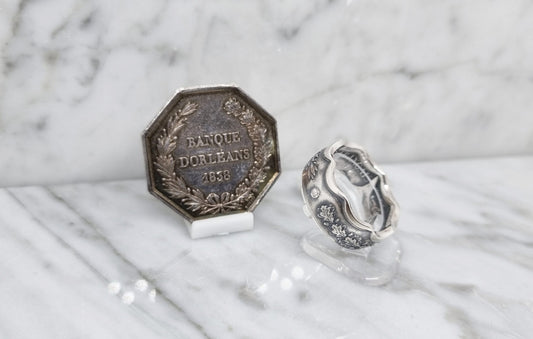 Bague jeton octogonale "Banque d'Orléans" en argent serti d'un diamant (coin ring)